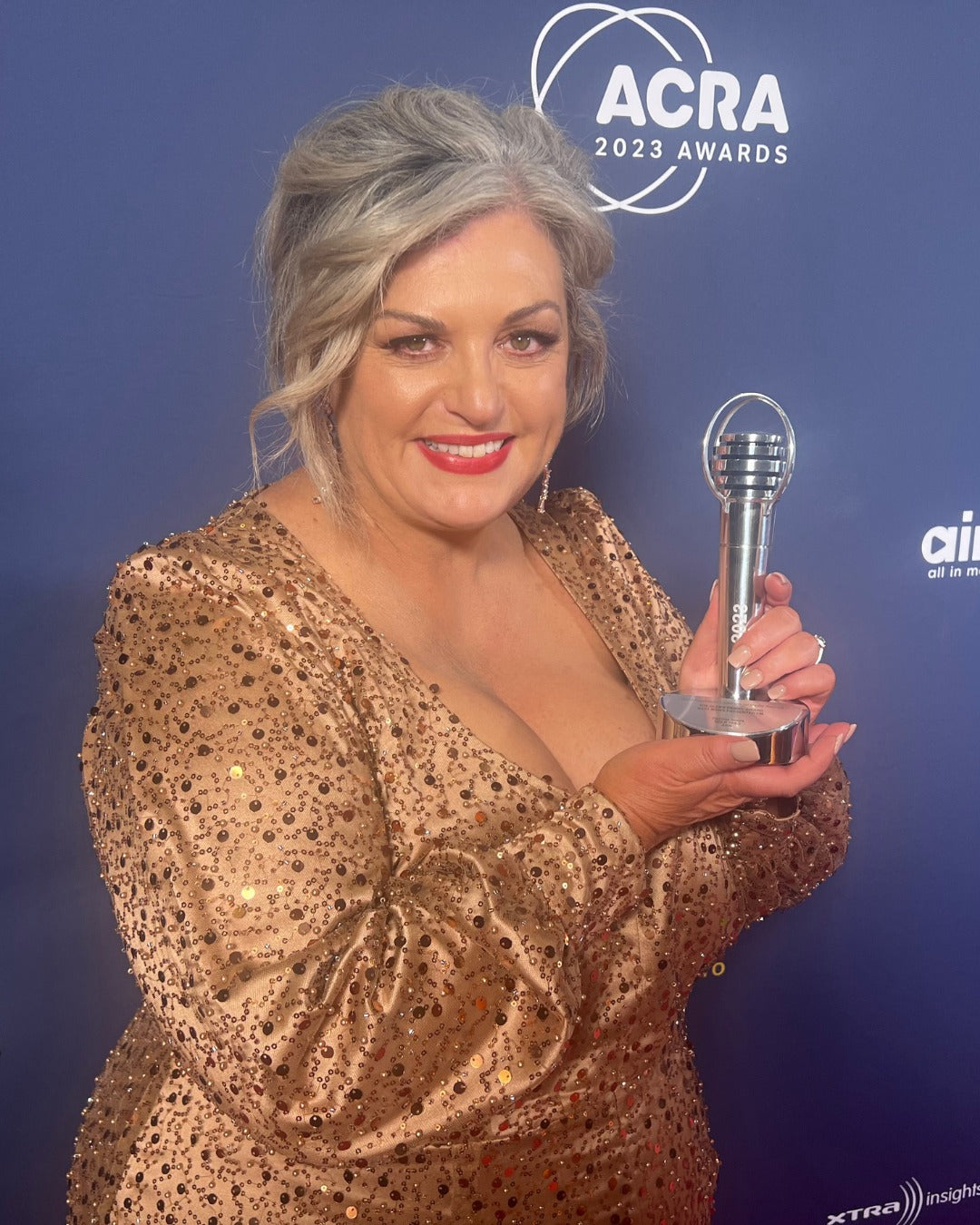 Patrina Jones in bespoke evening wear by Pearls and Roses Bridal